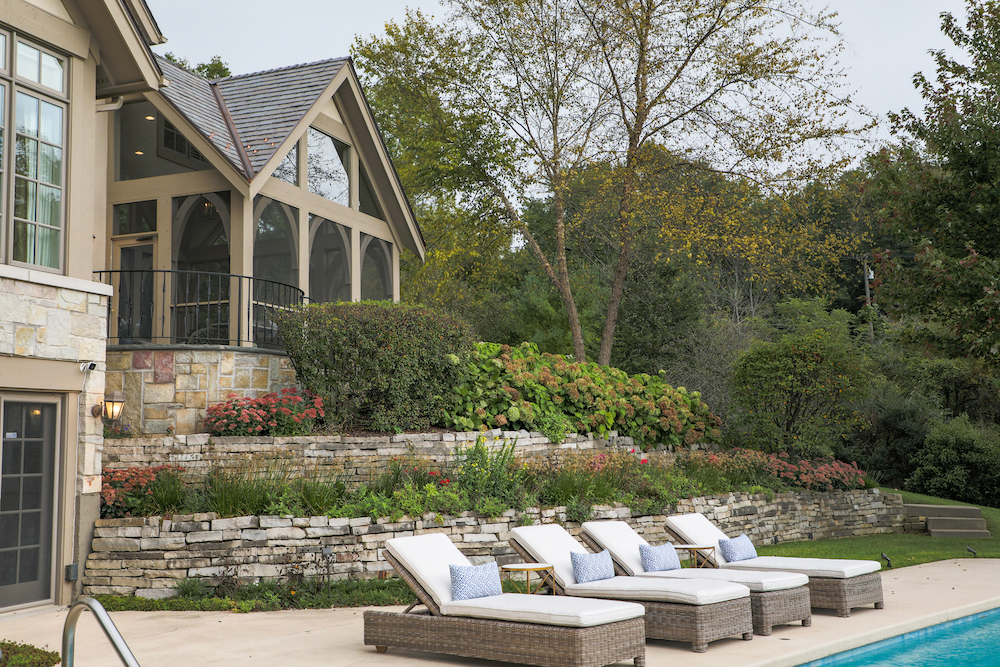 exterior view of screened porch with access to outdoor leisure