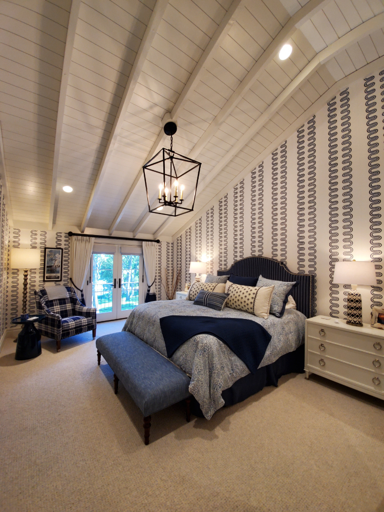 Vaulted ceiling with beams and wood boards